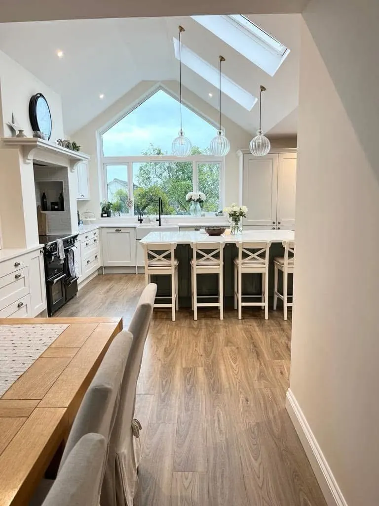 Vaulted kitchen extension with glass pendants over the island